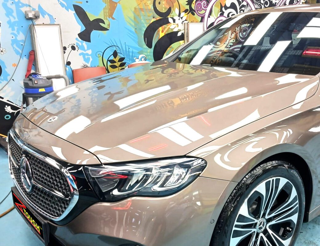 The Mercedes-Benz E200 from a side angle after the titanium coating.