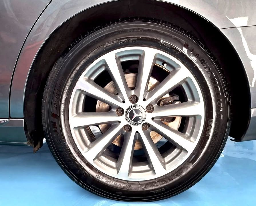 Multi-spoke alloy wheel and tyre on the Mercedes-Benz E200.