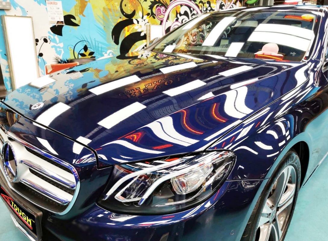 Side view of the Mercedes-Benz E200K after the titanium coating.