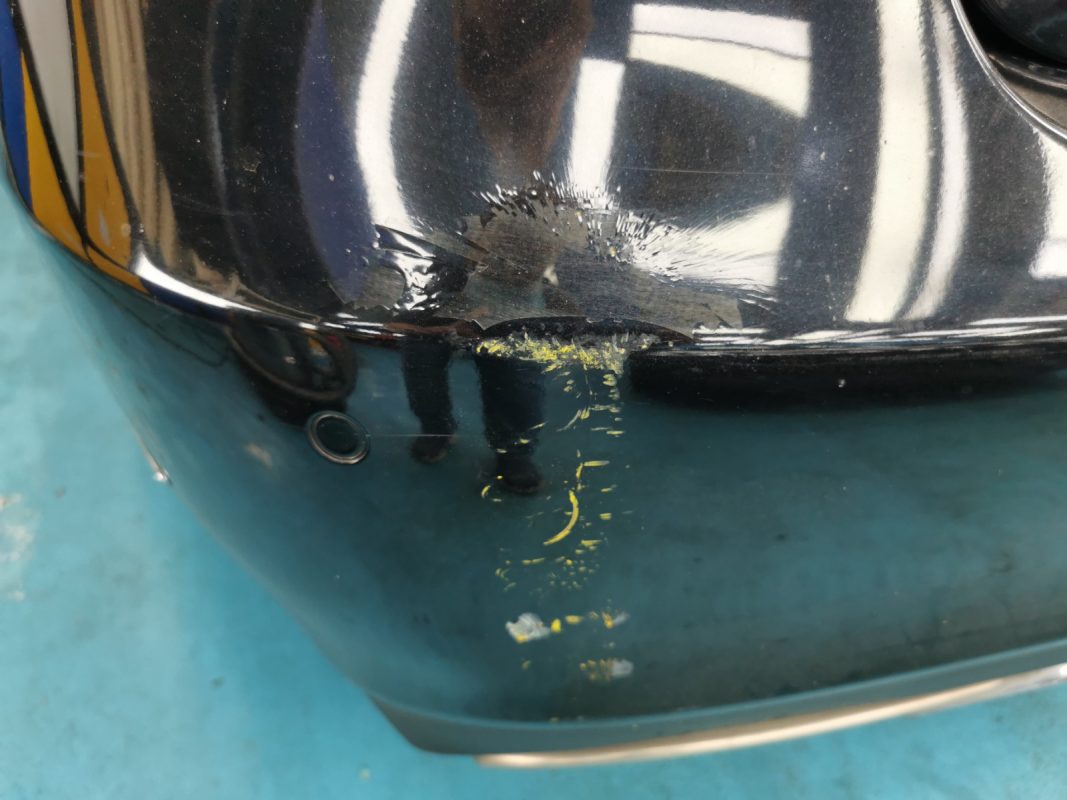Dull paintwork and chips on the Mercedes-Benz E250 at intake.