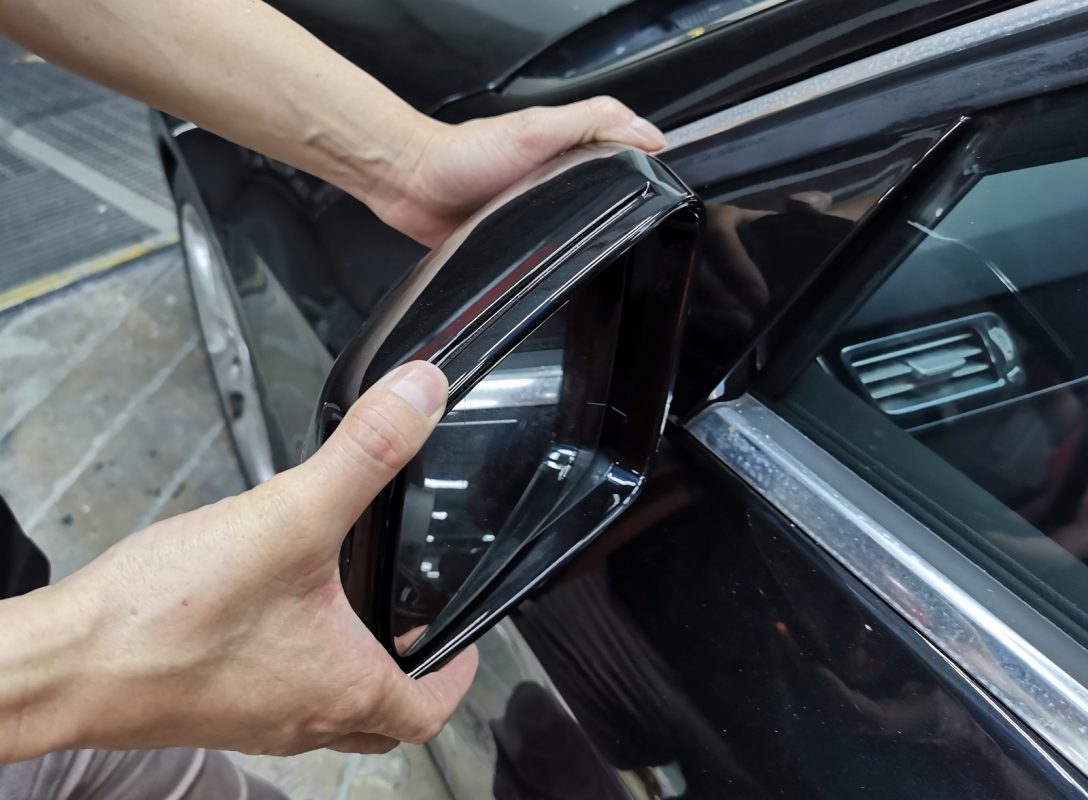 Polishing the new paint on the E250 to bring up the shine.