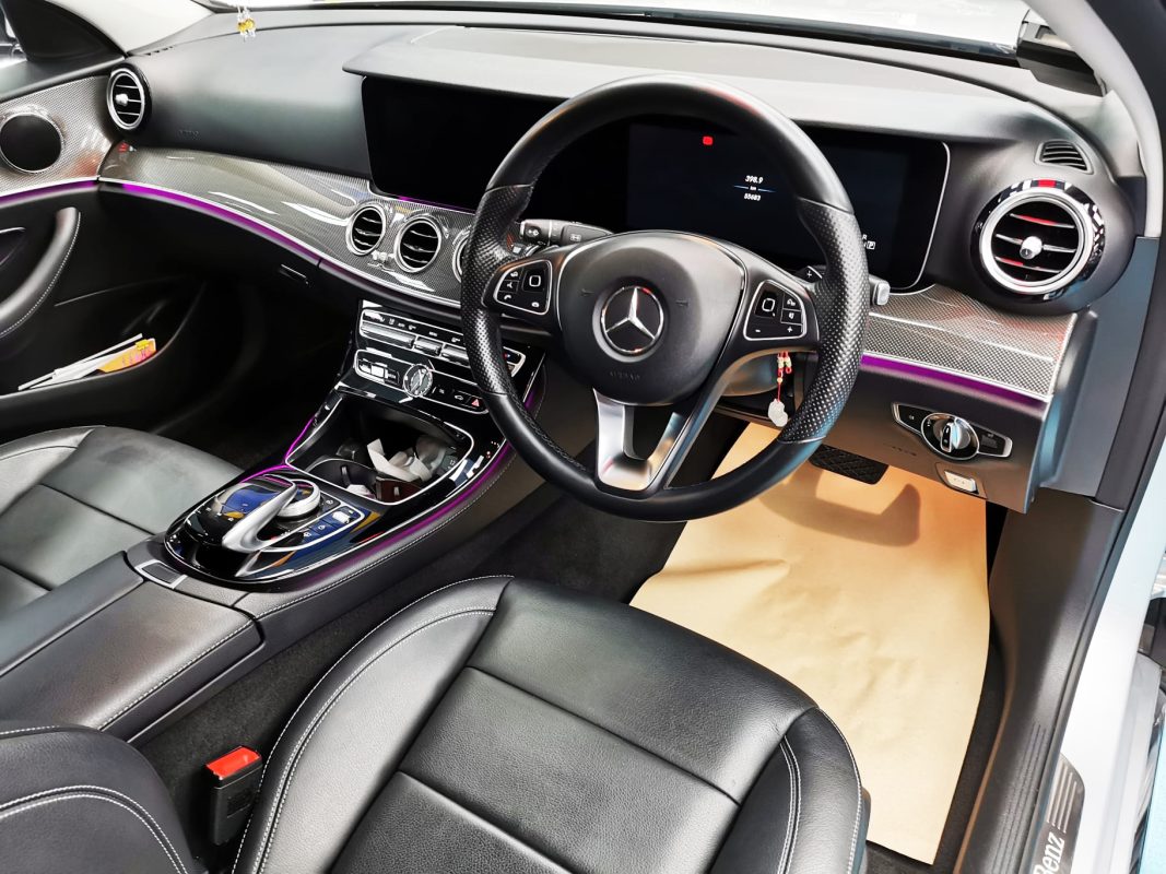 The Mercedes-Benz E250 parked in the workshop, freshly coated.
