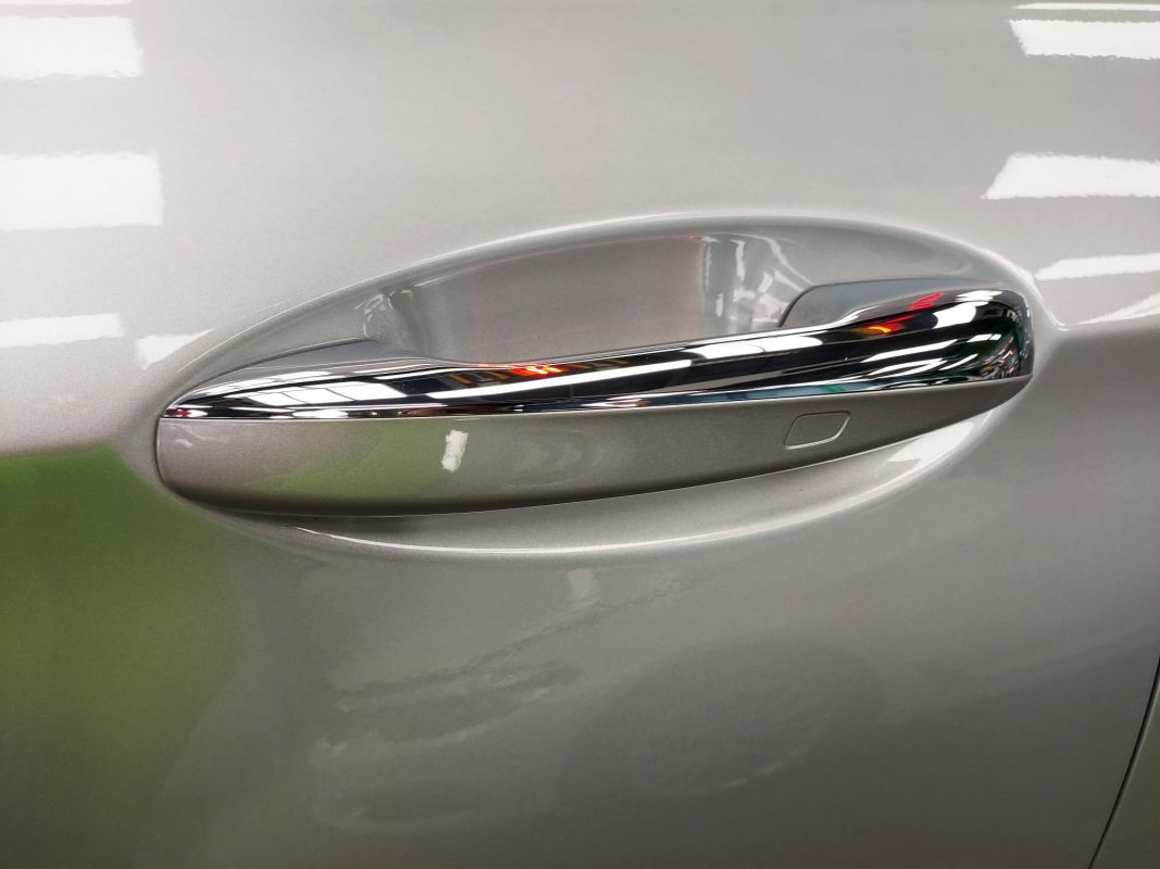 Rear quarter of the Mercedes-Benz E250A, glossy and protected.