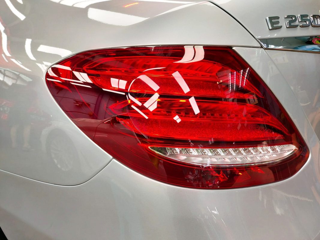 The bonnet of the E250A under workshop lighting.