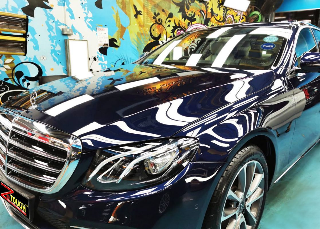 The Mercedes-Benz E300 from a side angle after the ceramic coating.