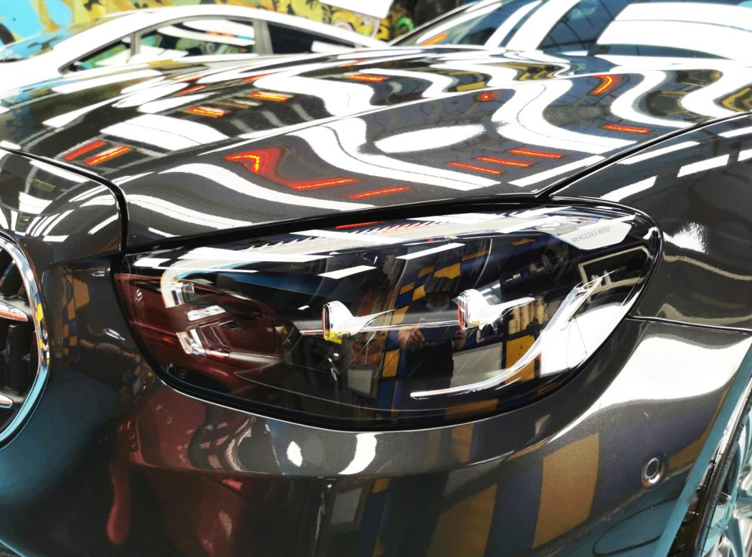 The E300e's coated paintwork showing clean reflections.