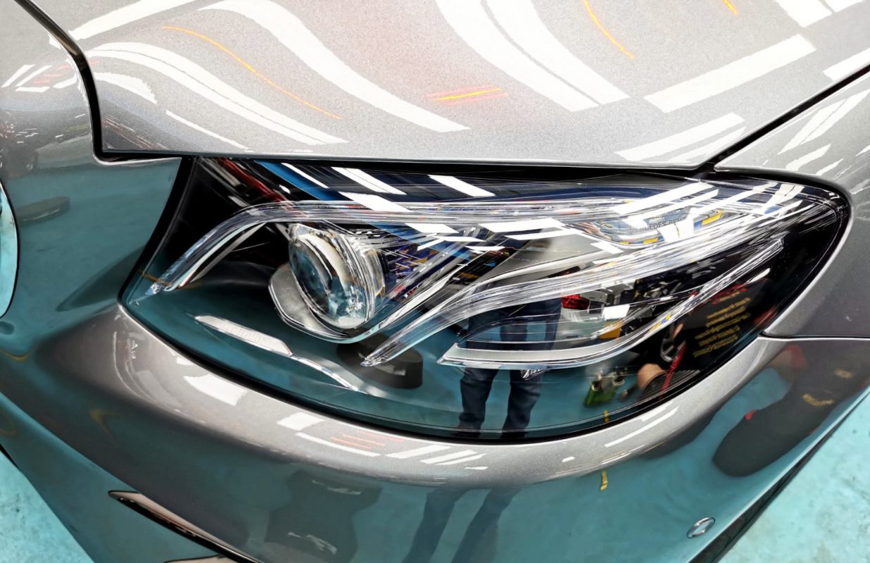 The E53's coated paintwork holding clean reflections.