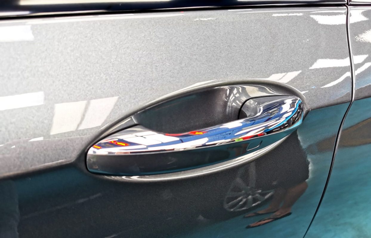 Rear quarter of the Mercedes-Benz E53, glossy and protected.