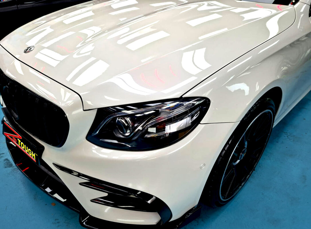 The Mercedes-Benz E53 from a side angle after the ceramic coating.