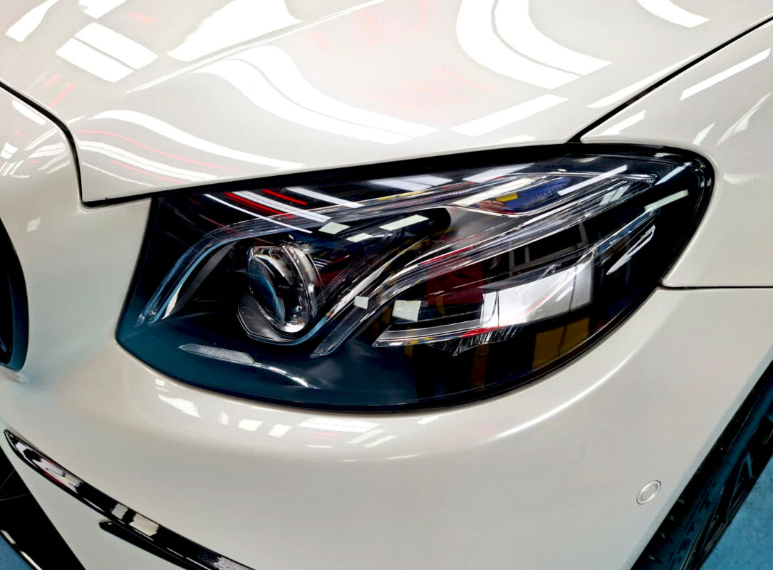 The E53's coated paintwork showing clean reflections.