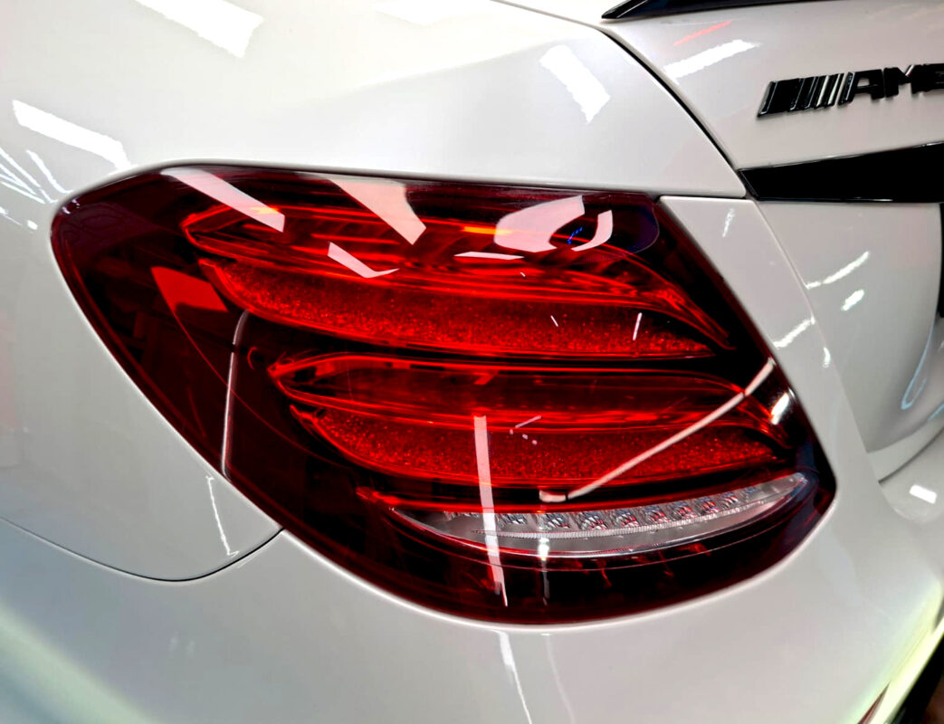Rear quarter of the Mercedes-Benz E53, glossy and protected.