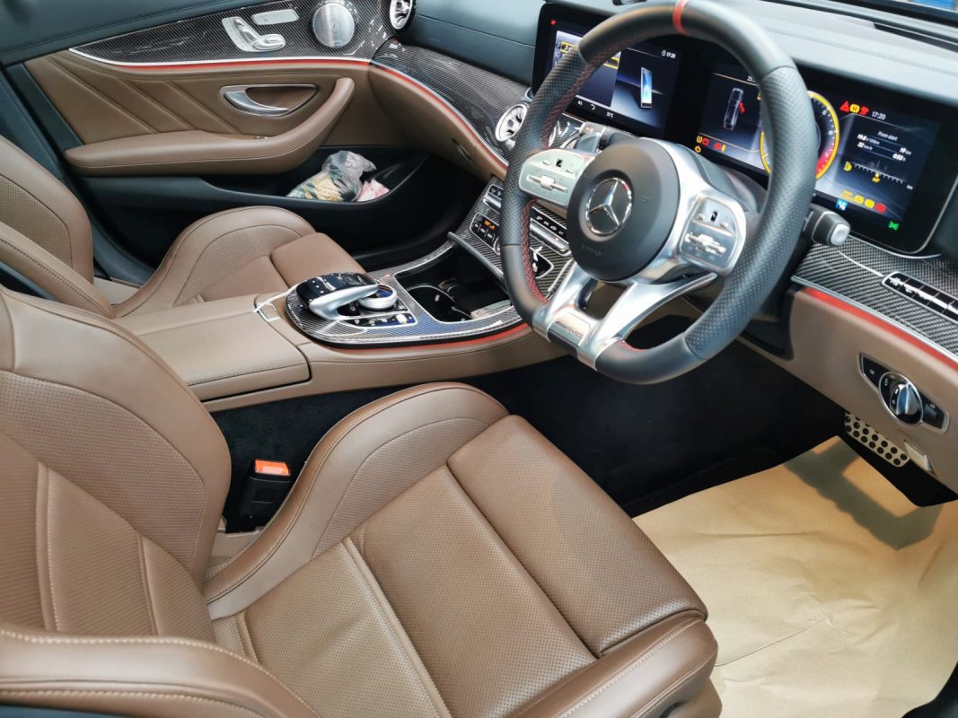 The Mercedes-Benz E63 parked in the workshop, freshly coated.
