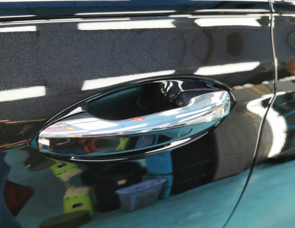 Rear quarter of the Mercedes-Benz E63, glossy and protected.