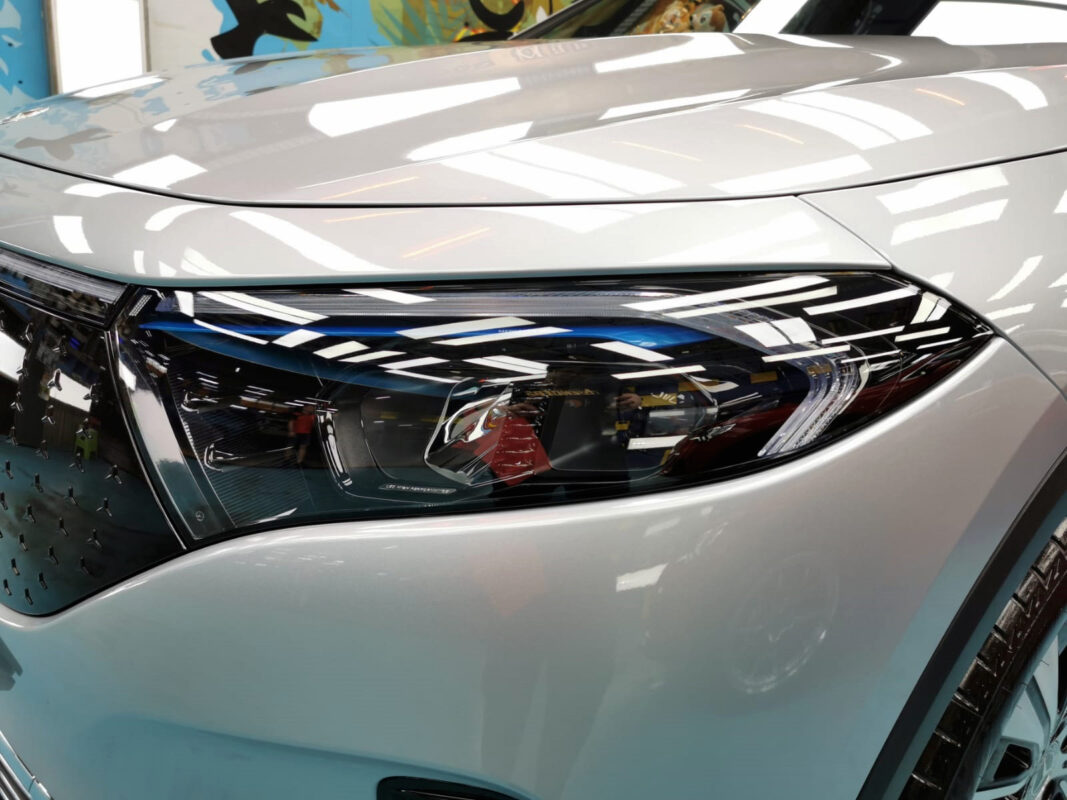 The EQA250+'s coated paintwork showing clean reflections.