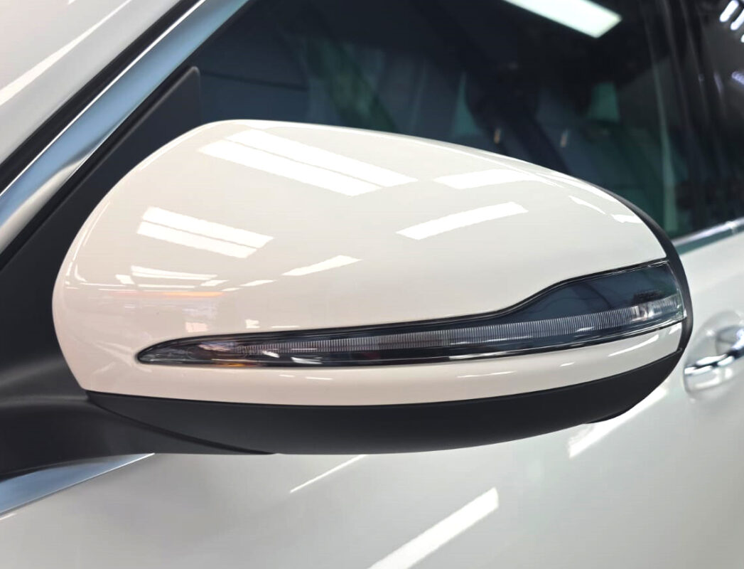 The Mercedes-Benz EQB 250+ parked in the workshop, freshly coated.