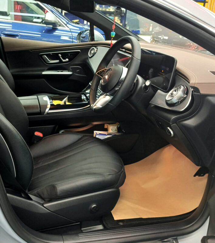 The EQE 300's coated paintwork showing clean reflections.