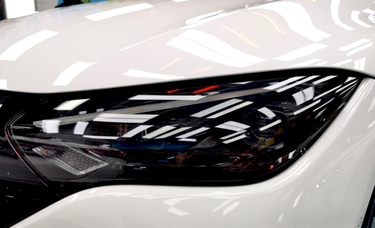 The EQE350's coated paintwork showing clean reflections.