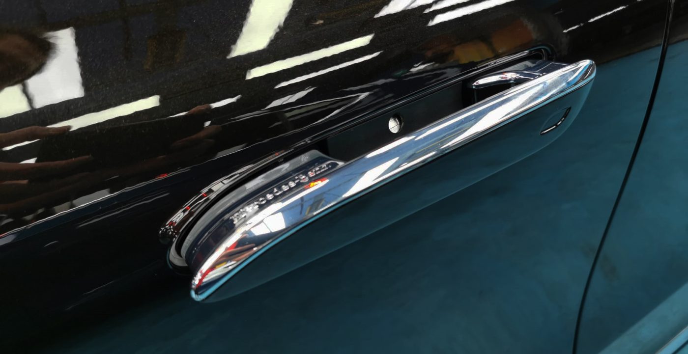 Rear quarter of the Mercedes-Benz EQS 450+, glossy and protected.