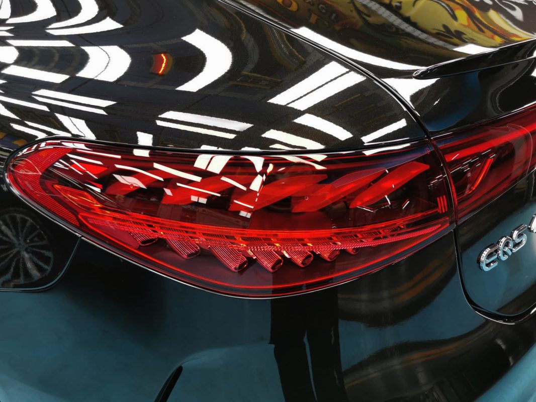 The bonnet of the EQS 450+ under workshop lighting.