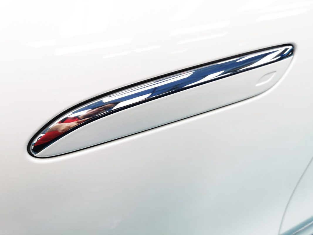 Rear quarter of the Mercedes-Benz EQS450+, glossy and protected.