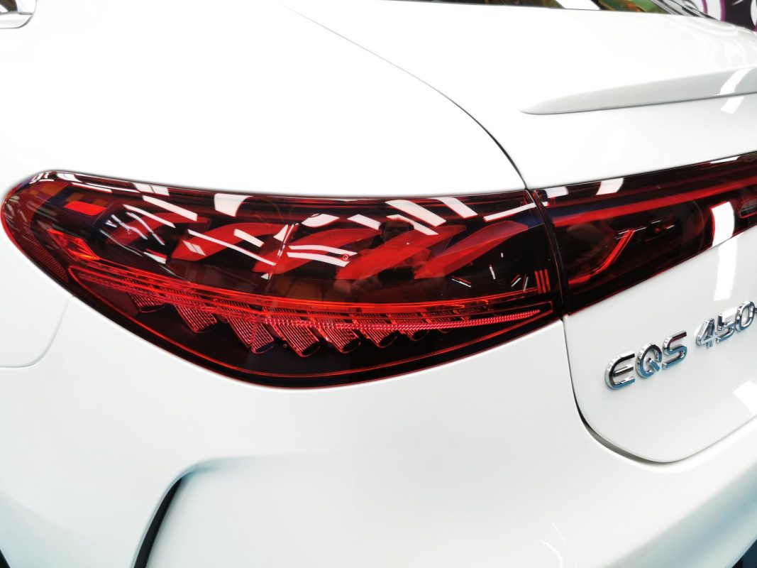 The bonnet of the EQS450+ under workshop lighting.