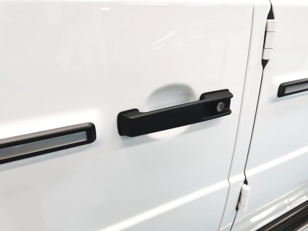 Rear quarter of the Mercedes-Benz G400 AMG, glossy and protected.
