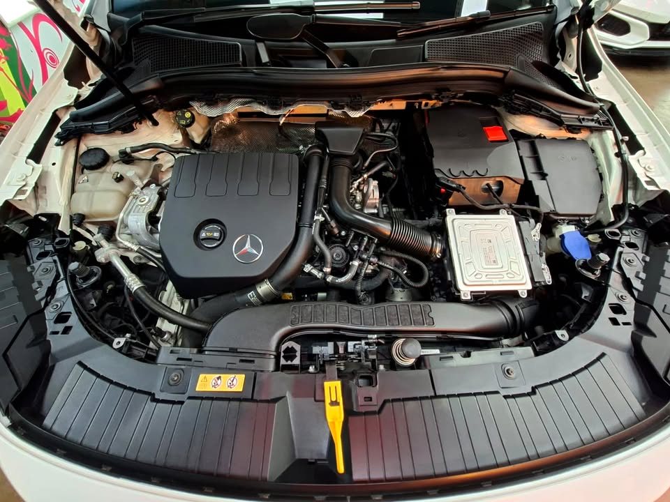 Clean engine bay of the GLA 180 with the bonnet open.