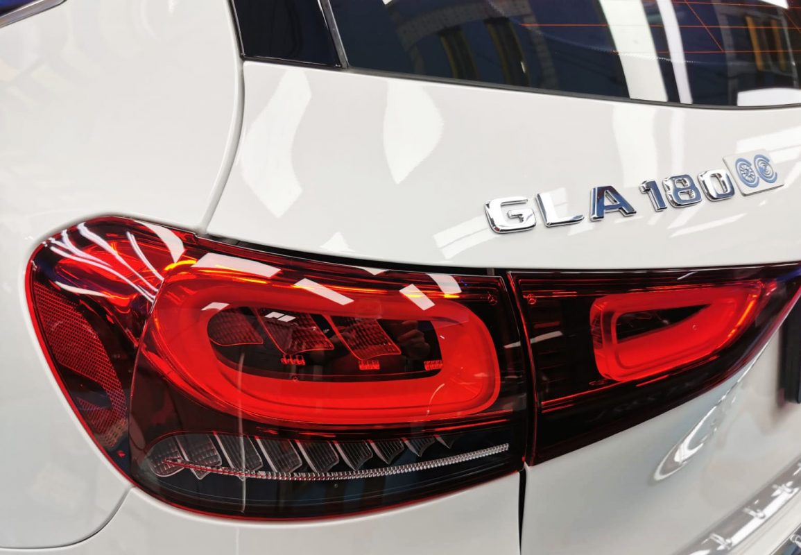 The coated bonnet of the GLA 180 under workshop lighting.