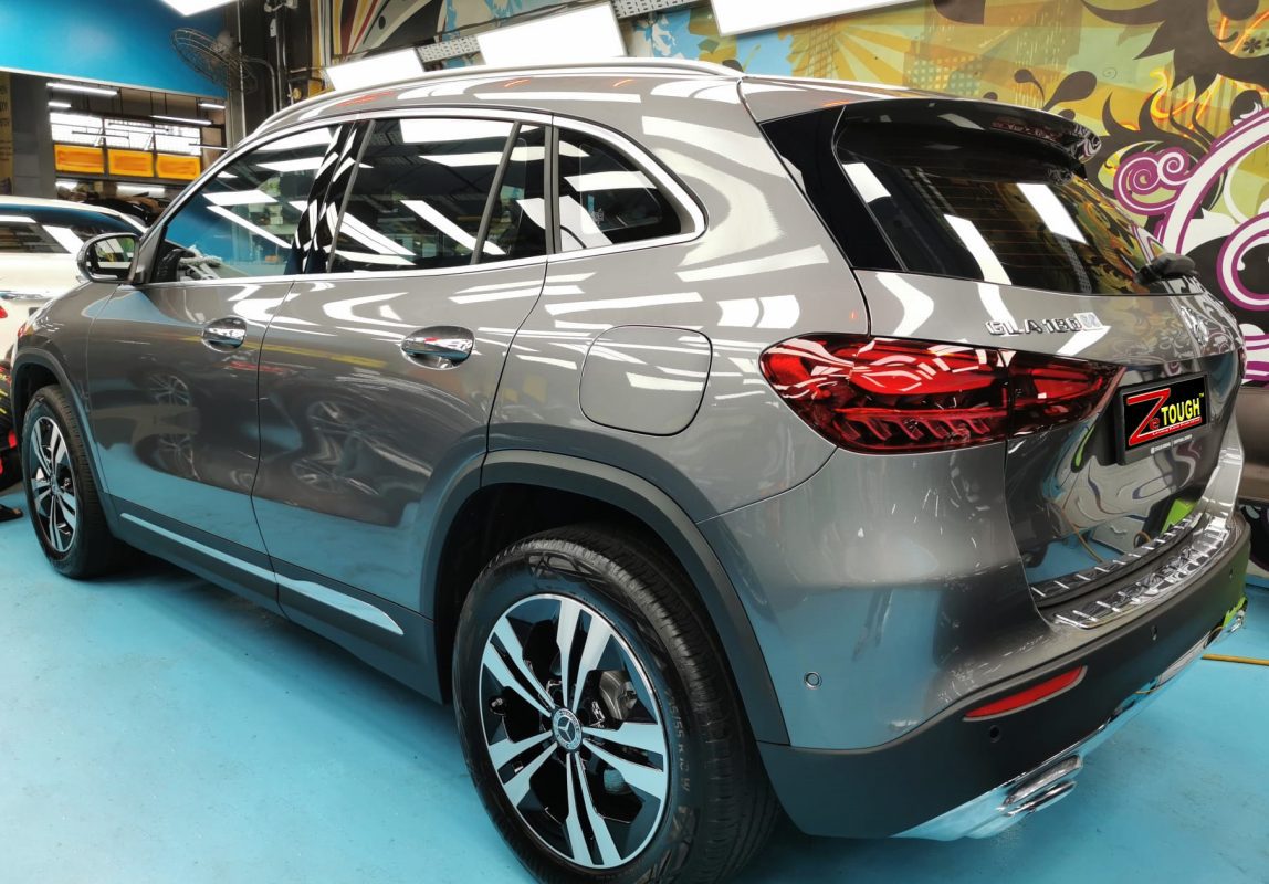 Rear quarter of the Mercedes-Benz GLA180, glossy and protected.