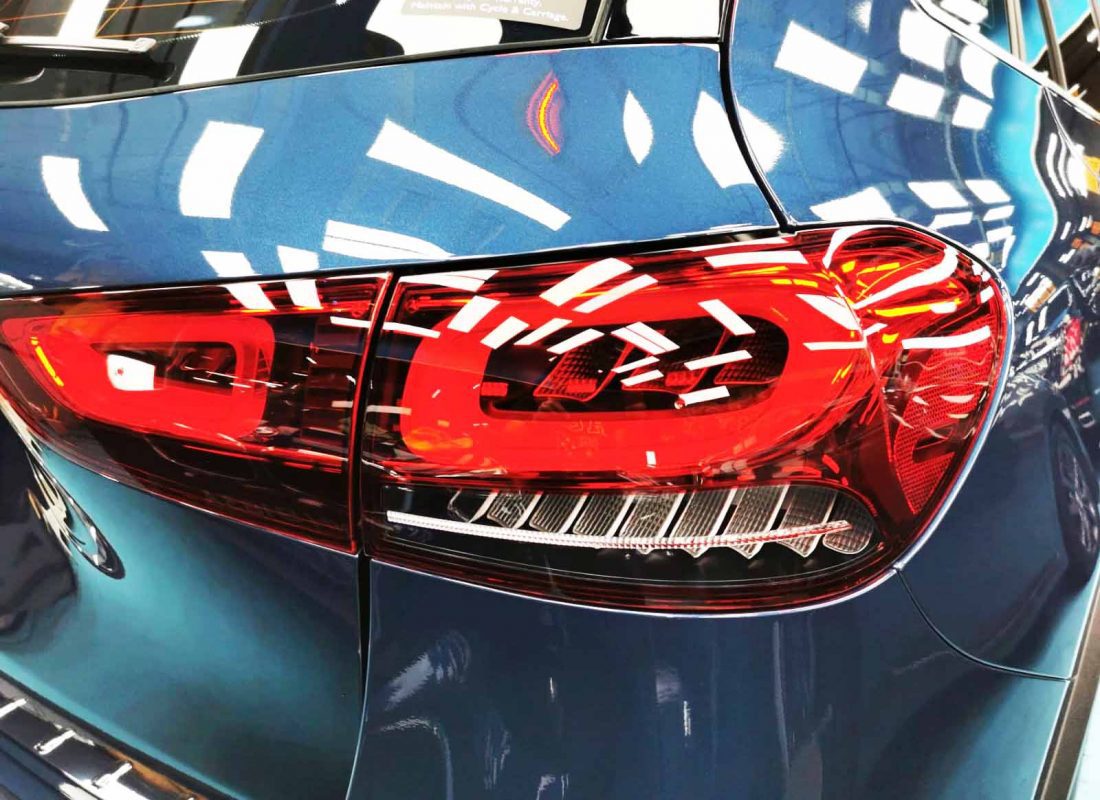 The coated bonnet of the GLA180 under workshop lighting.