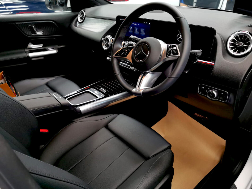 The Mercedes-Benz GLA180 parked in the workshop, freshly coated.
