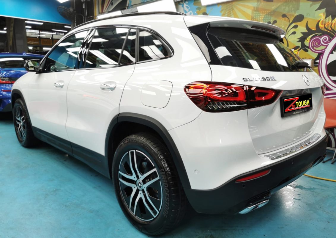 Rear quarter of the Mercedes-Benz GLA180, glossy and protected.