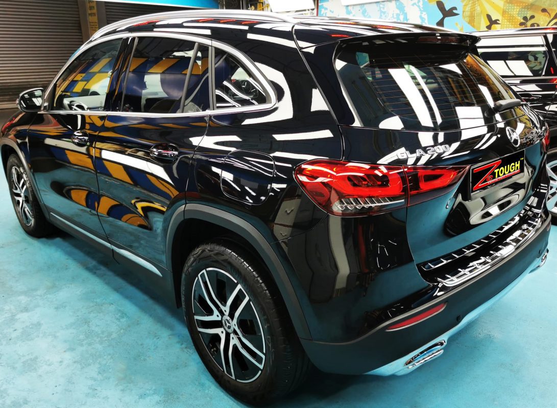 Rear quarter of the GLA200, glossy and protected.