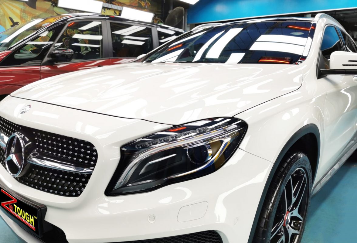 The Mercedes-Benz GLA250 from a side angle after the titanium coating.