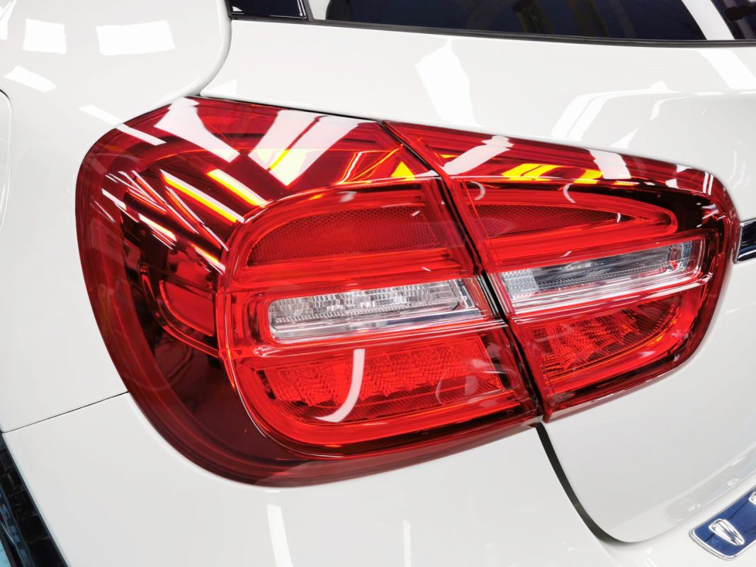 The coated bonnet of the GLA250 under workshop lighting.