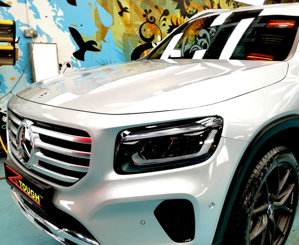The Mercedes-Benz GLB 180 from a side angle after the titanium coating.