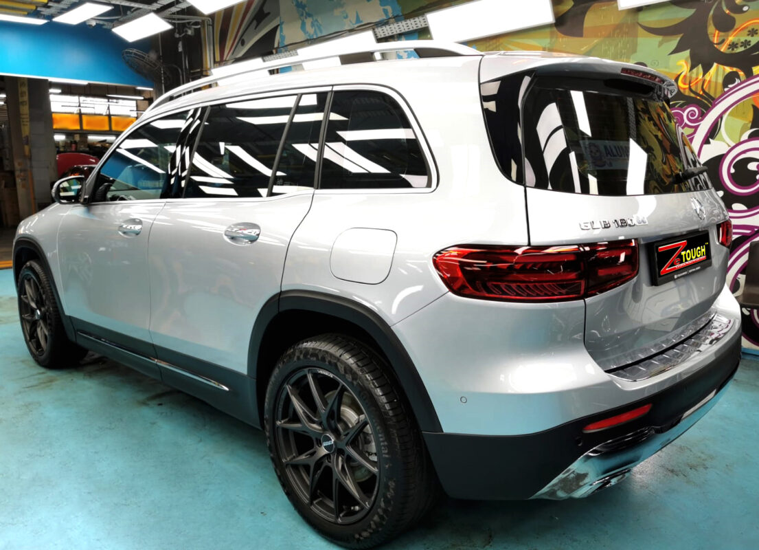 Rear quarter of the Mercedes-Benz GLB 180, glossy and protected.