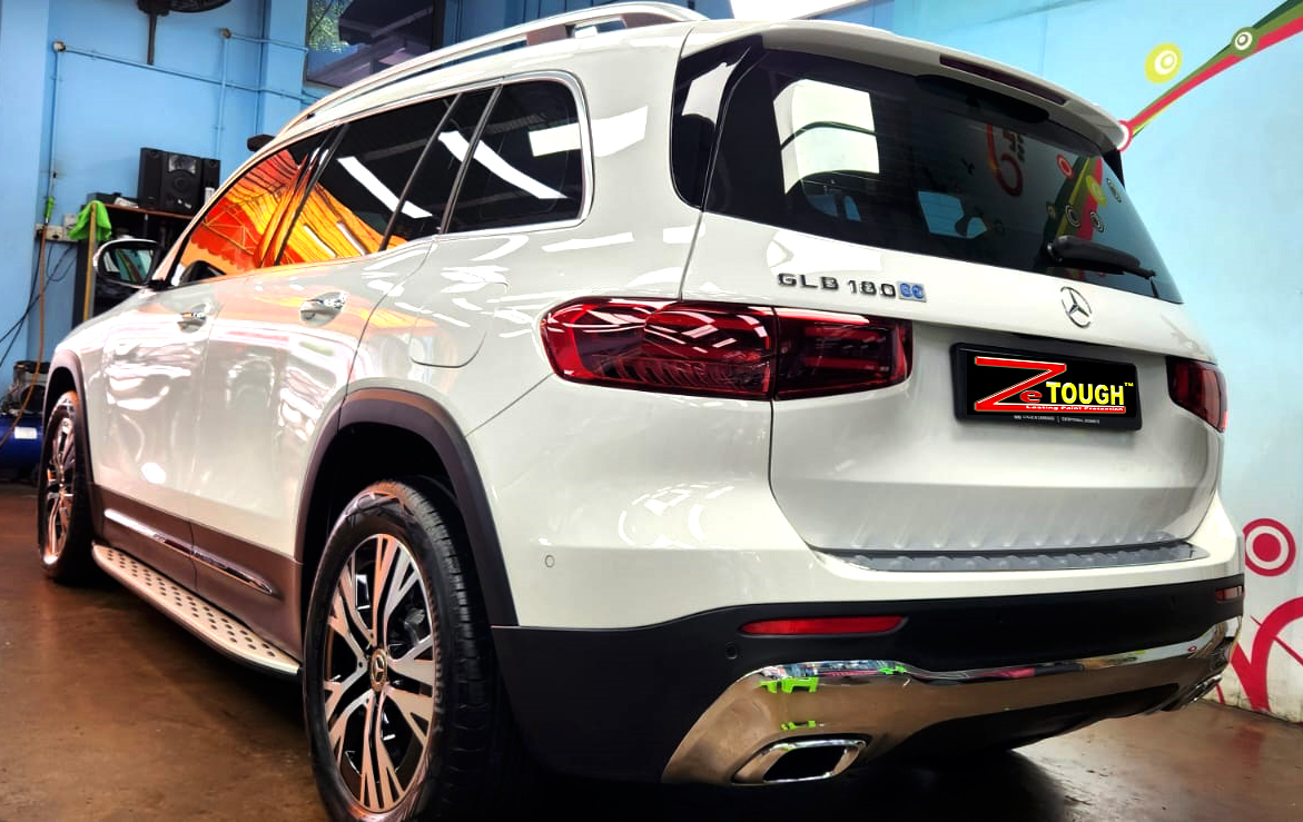 Rear quarter of the Mercedes-Benz GLB180, glossy and protected.