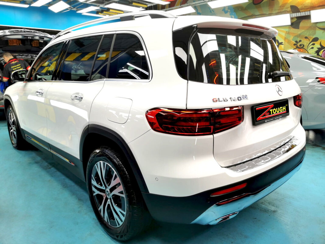 Rear quarter of the Mercedes-Benz GLB180, glossy and protected.