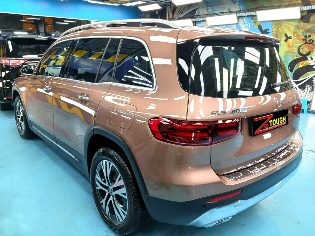 Rear quarter of the Mercedes-Benz GLB180, glossy and protected.