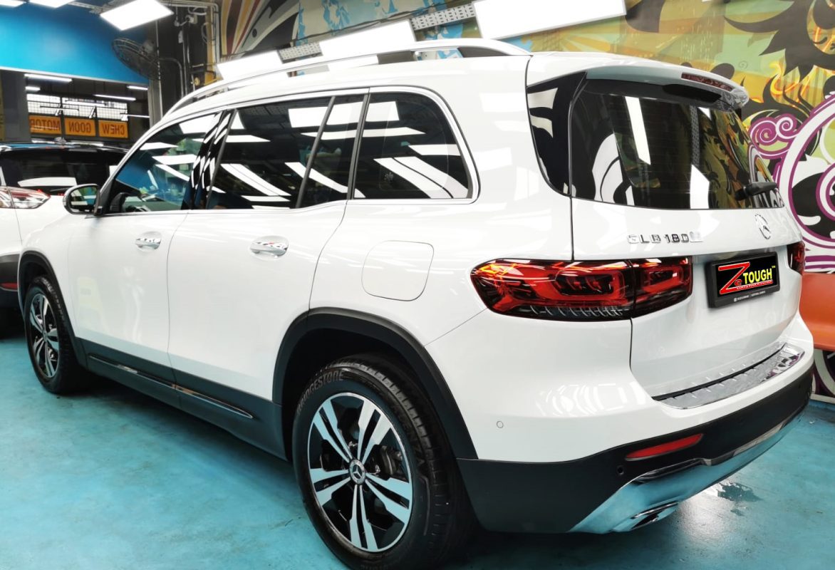 Rear quarter of the Mercedes-Benz GLB180, glossy and protected.