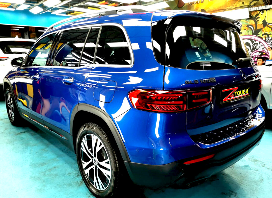 Rear quarter of the Mercedes-Benz GLB180, glossy and protected.