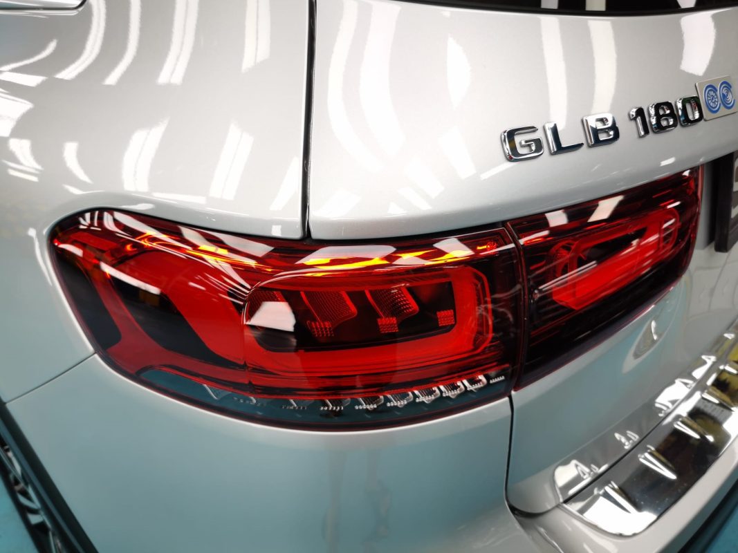 The coated bonnet of the GLB180 under workshop lighting.