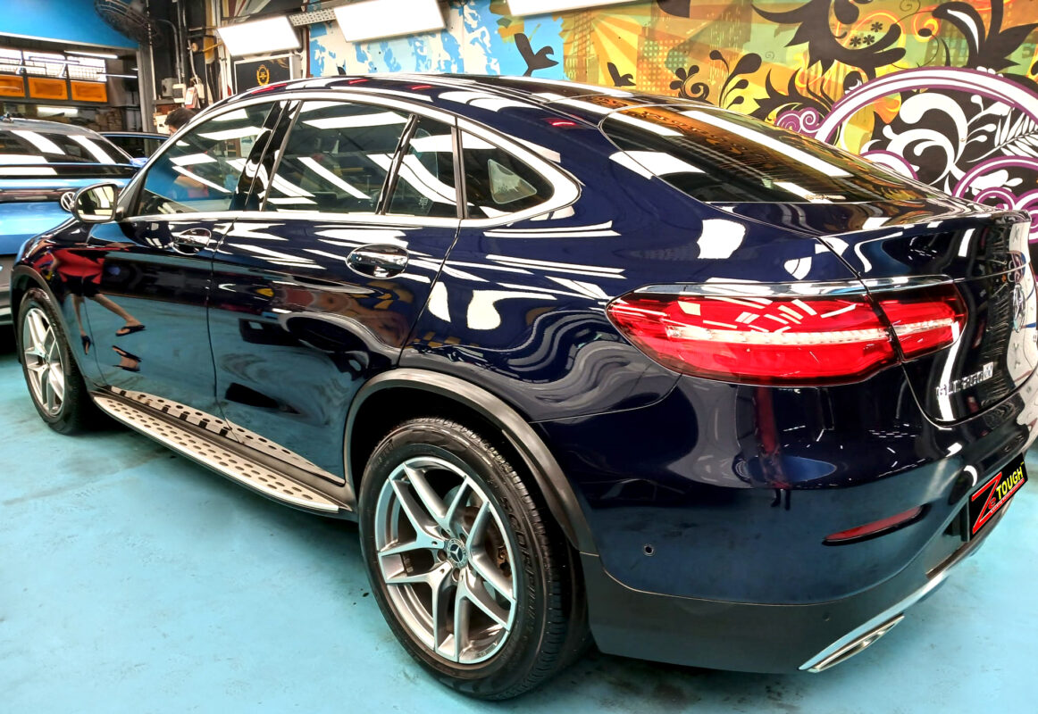 Rear quarter of the Mercedes-Benz GLC 250, glossy and protected.