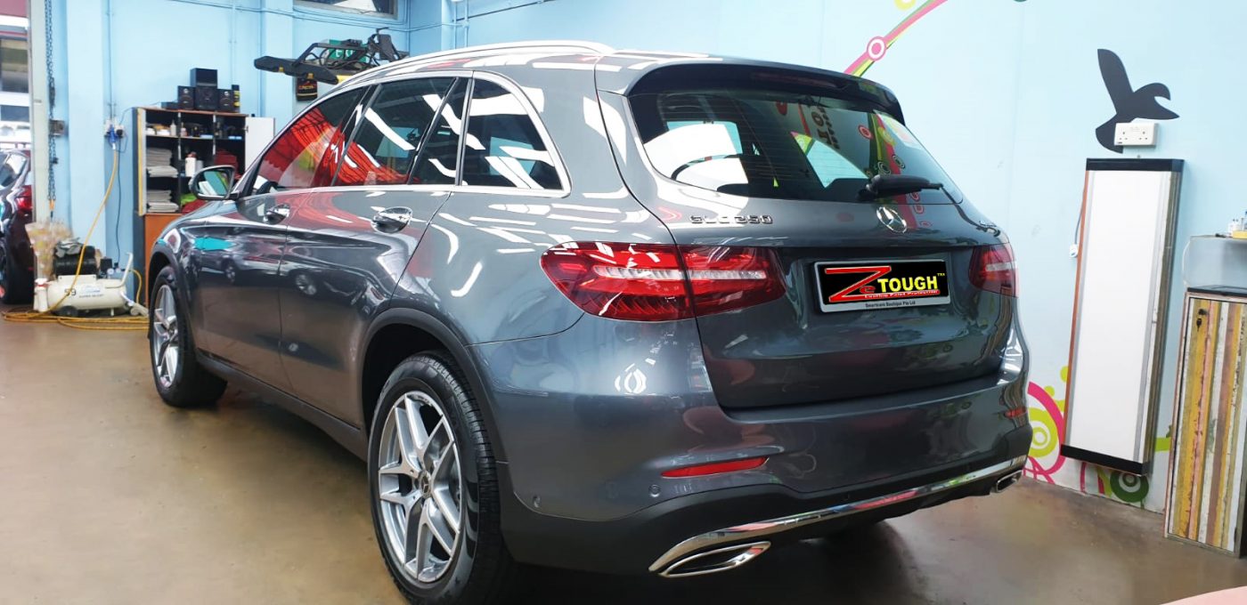 Rear quarter of the Mercedes-Benz GLC250 AMG, glossy and protected.