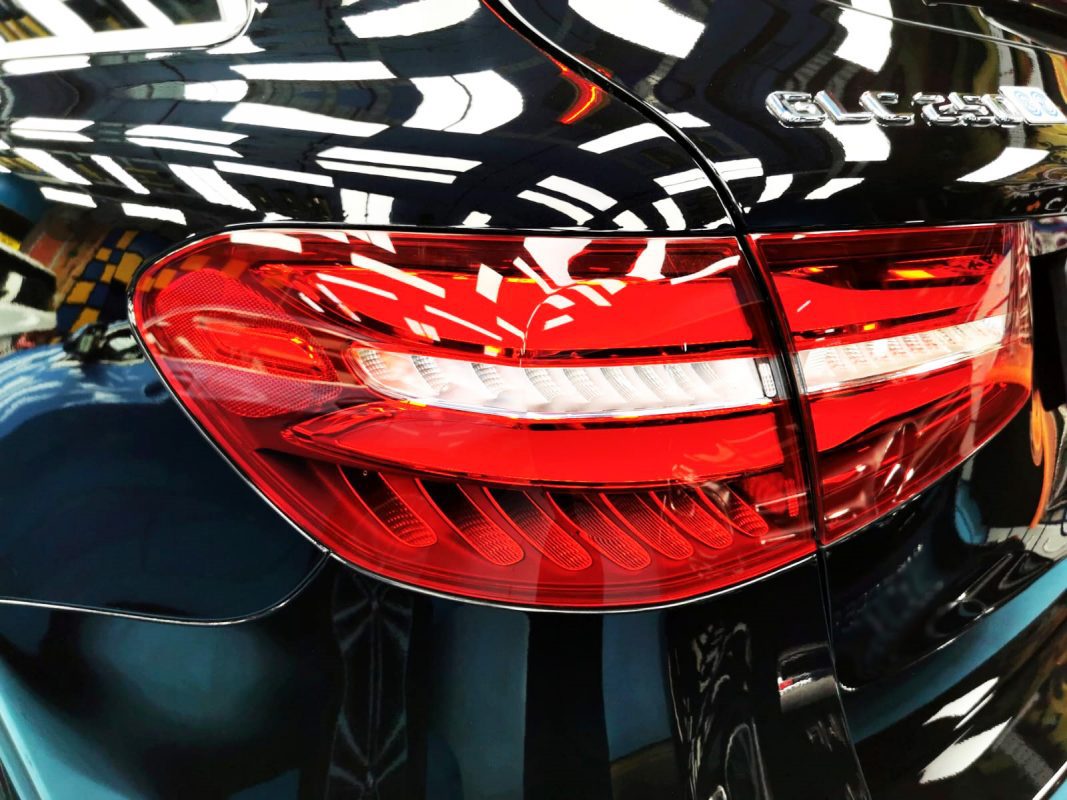 The coated bonnet of the GLC250 under workshop lighting.