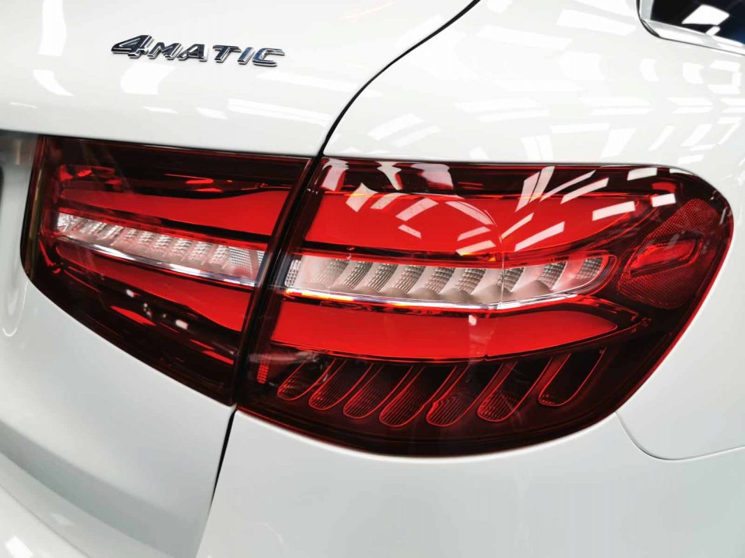 The coated bonnet of the GLC250 under workshop lighting.