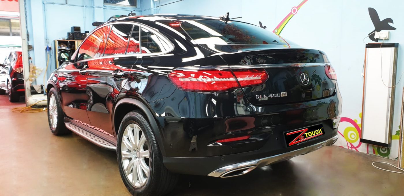 Rear quarter of the Mercedes-Benz GLE400, glossy and protected.