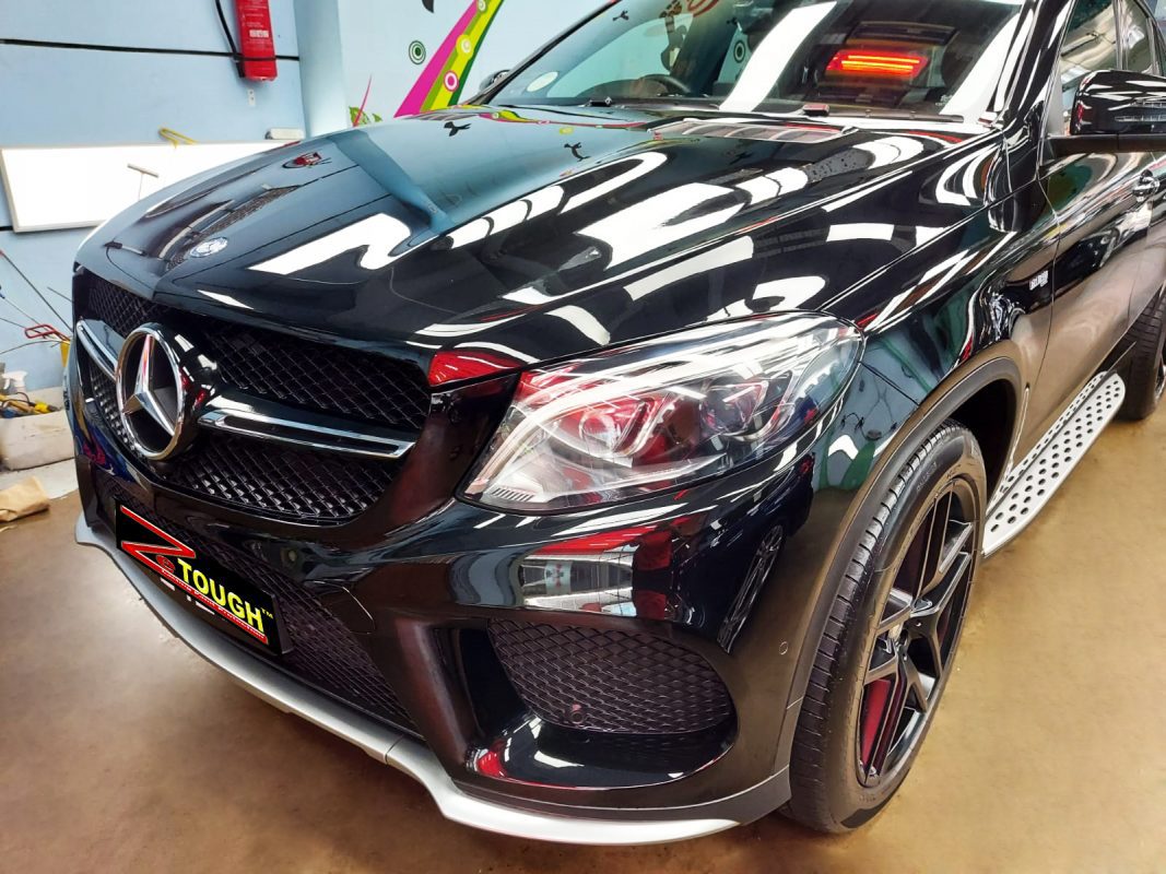 The Mercedes-Benz GLE450 AMG from a side angle after the titanium coating.