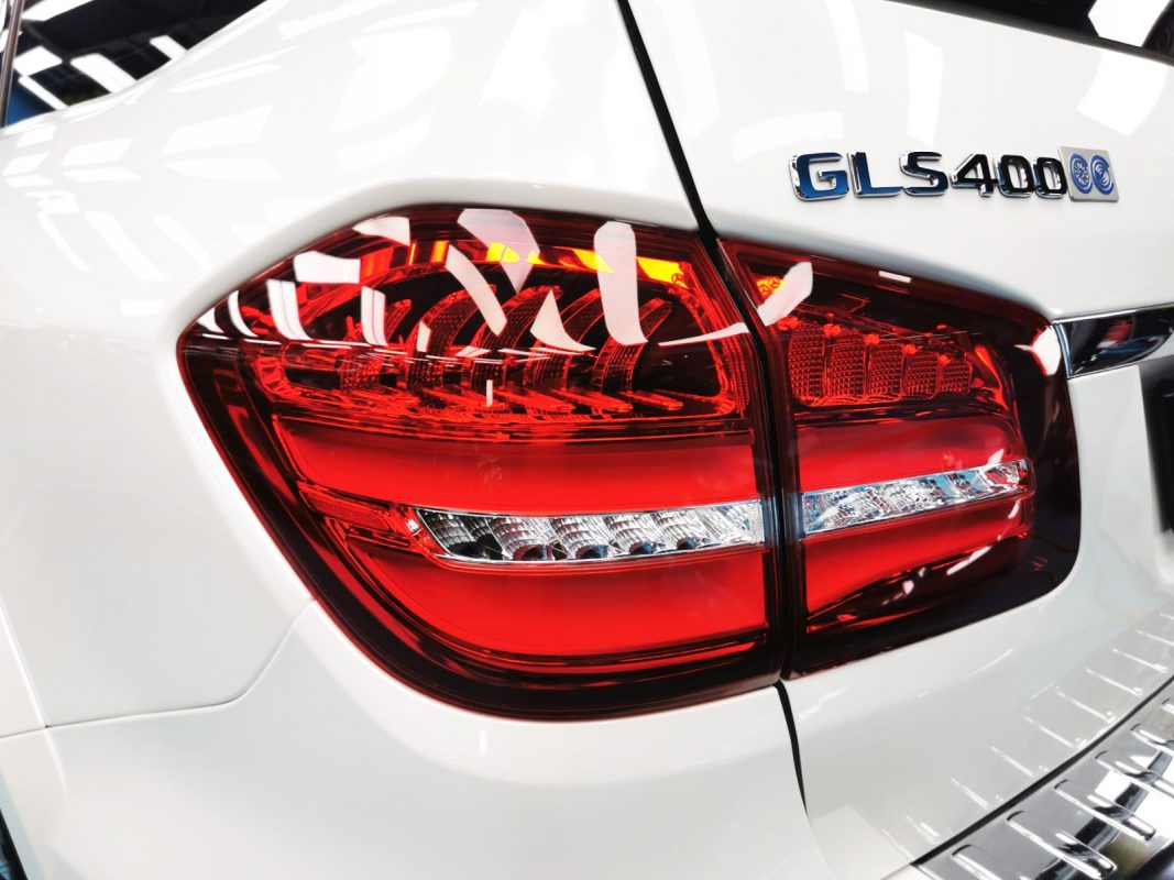 The coated bonnet of the GLS400 under workshop lighting.